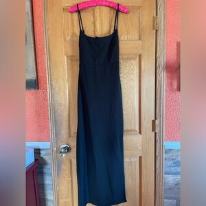 Women’s spaghetti strap black dress.